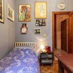 Maxi comfort in mini spazio: camere da letto matrimoniali con armadio a ponte